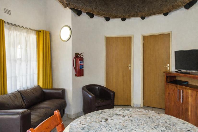 Badplaas, A Forever Resort: 4-Sleeper Rondavel. 2 bedrooms (1 double & 2 single rooms)